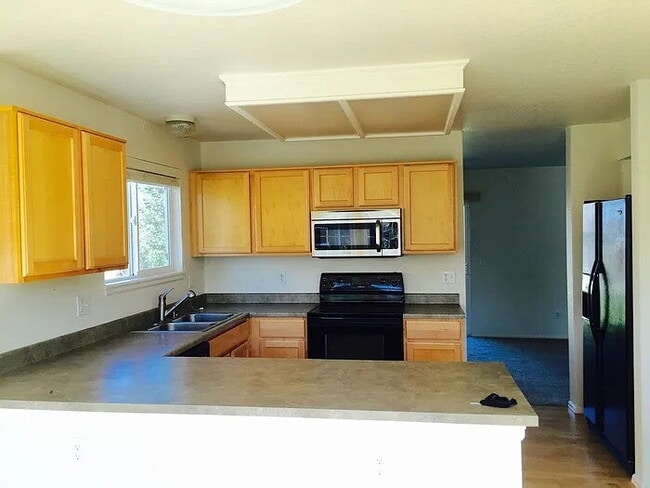 Building Photo - "Spacious 4-Bed Retreat in Parker, CO - Yo...