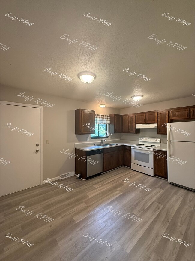 Building Photo - 12915 W 61st Terrace