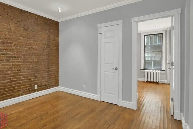 Foto del edificio - 219 E 23rd St