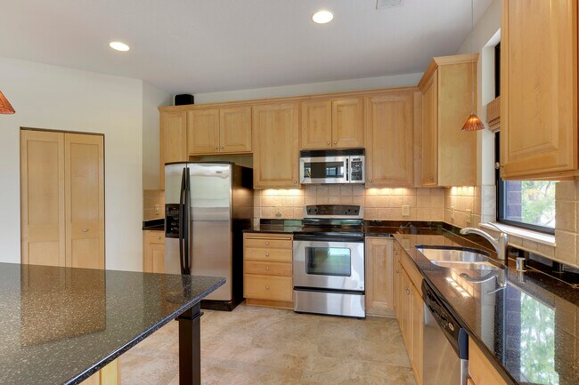 Updated stainless steel appliances and granite countertops - 199 Sherman St