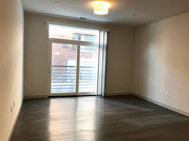 living room with Juliet balcony - 99 tremont street