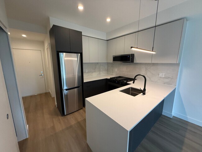 Photo du bâtiment - Bright 2 Bedroom Condo in Delta