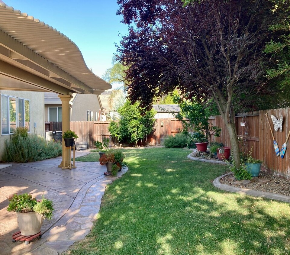 Building Photo - Spacious 4-Bedroom Home in Woodland –Cul-d...