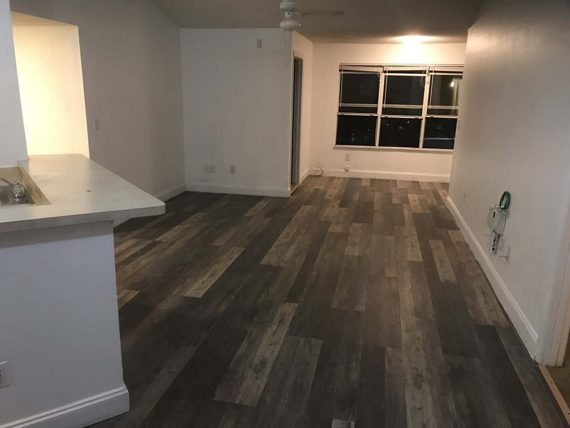 Living Room area. New flooring - 4512 Commander Dr
