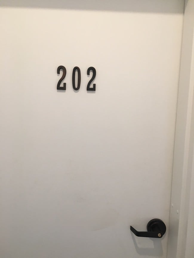 outside door leading to apartment unit - 511 Toulouse St