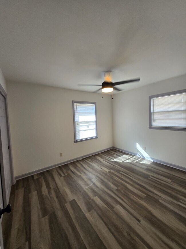 Building Photo - Fully Renovated Beauty with Spacious Kitchen, Separate Living Areas & Modern LVP Flooring