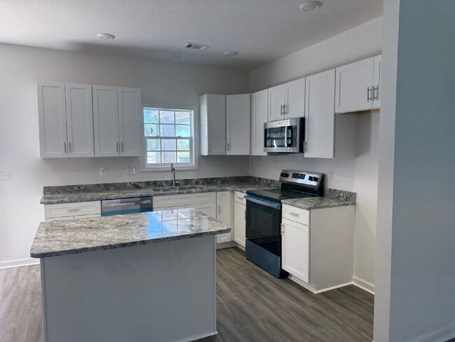 Building Photo - Brand New Luxury 3 Bedroom 2 Bath Condo in...
