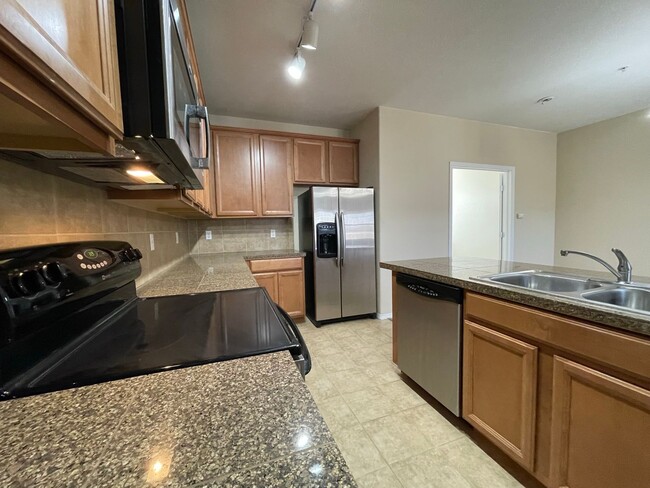 Building Photo - Quiet, Open and Private! Attached 2 CAR Ga...