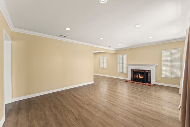 Living room leading into dining/kitchen area - 12938 Jefferson Ave