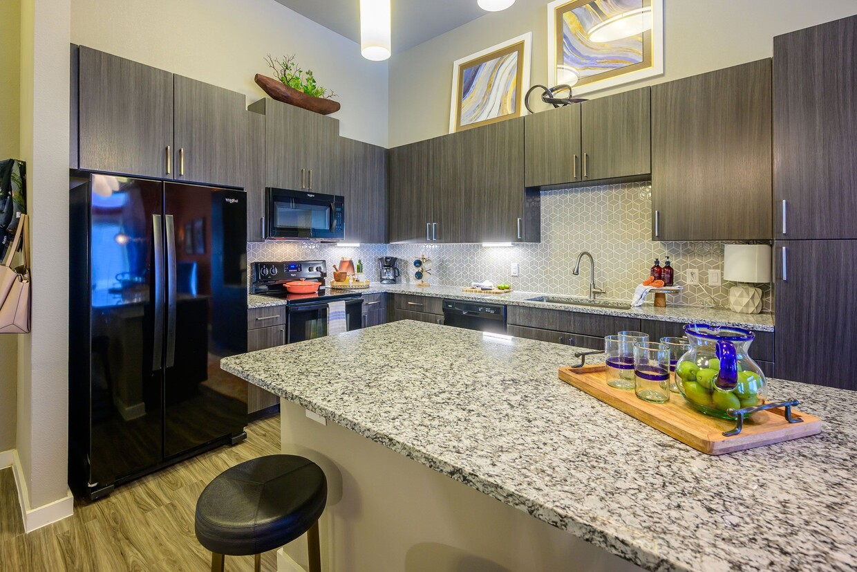 Harmony Luxury Apartments full size kitchen - Harmony Luxury Apartments