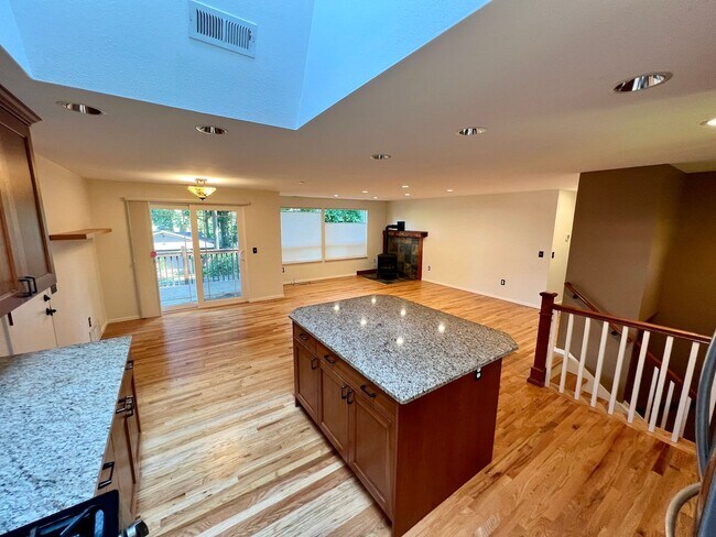 Building Photo - Spacious and Serene: Stunning 4-Bedroom Re...