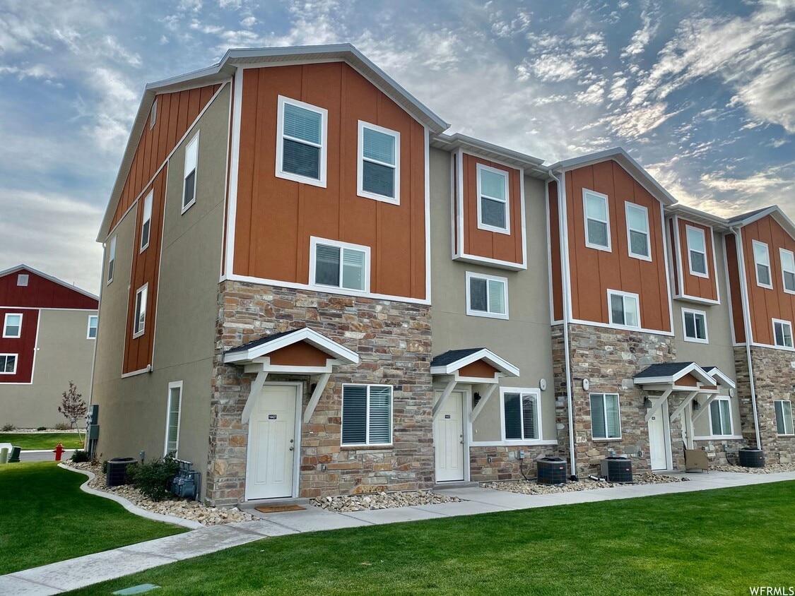 Primary Photo - Gorgeous 3-Story Townhomes in Payton's Qua...