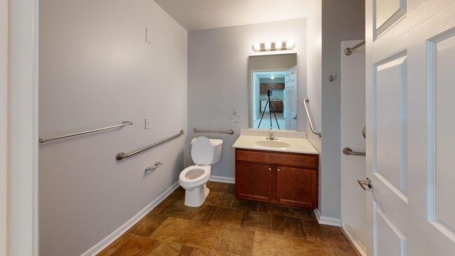 Bathroom With Handrails and Walk-In Shower - Meyer Pointe Senior Apartments