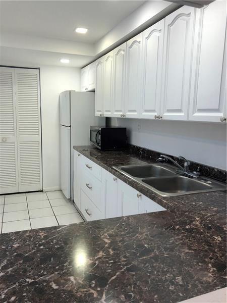 Building Photo - 6572 Racquet Club Dr