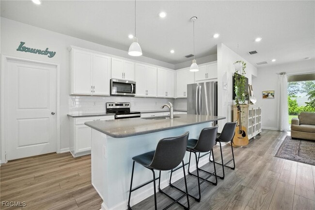 Building Photo - 6565 Good Life St
