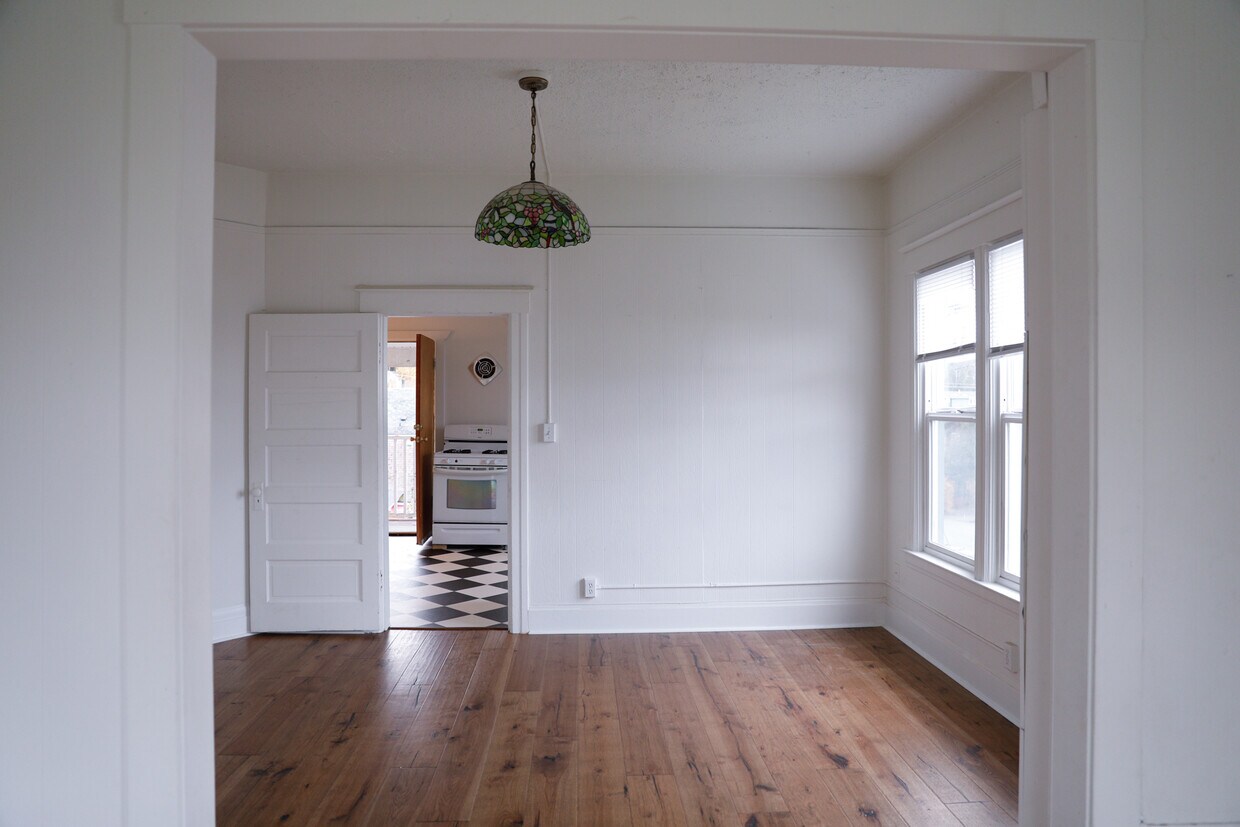 Spacious dining room with new hardwood floors - 2622 McCarver St
