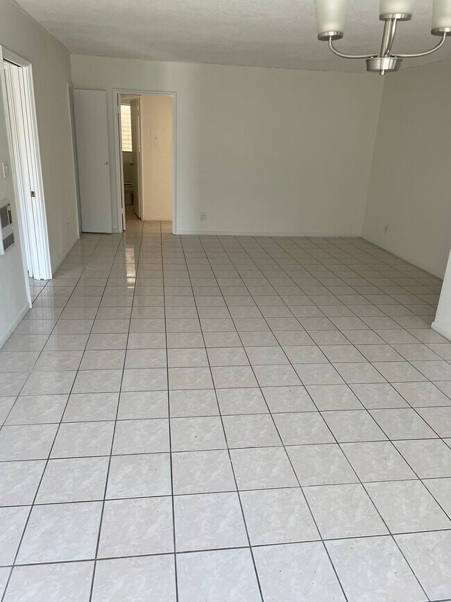 Recently remodeled floors - 7617 De Longpre Ave