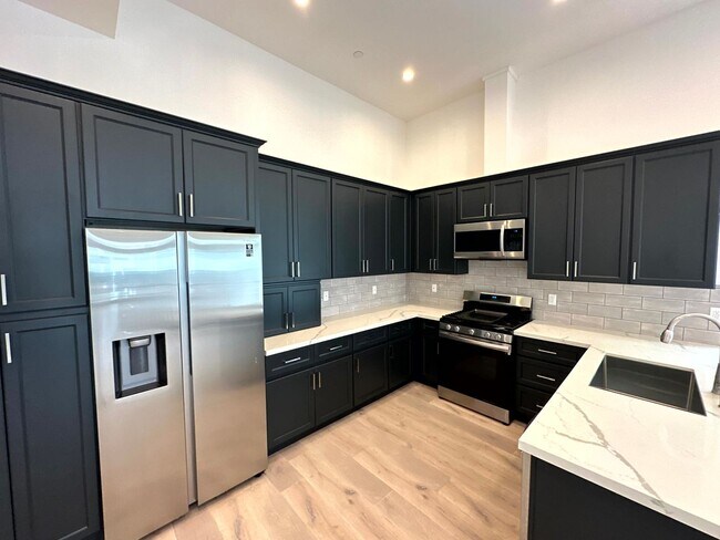 Building Photo - Beautiful Modern Luxury 4 Story Townhome -...