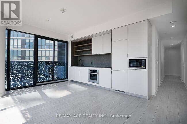 Building Photo - 55 Charles St E