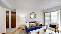 Located at 4142 SW Sixth Ave in Topeka, Kansas, this one-bedroom, one-bathroom residence offers a thoughtfully arranged single-floor layout. The living room serves as the heart of the home, featuring plush carpeting, a textured ceiling, and a large sliding glass door with vertical blinds that fills the space with natural light and provides access to the outdoors. A tiled entryway transitions seamlessly into the carpeted living area, lending a practical and welcoming flow throughout.

The galley-style kitchen is equipped with warm honey-toned wood cabinetry, light countertops, and hardwood-style flooring. It includes a full suite of appliances — a refrigerator, stovetop range, and dishwasher — along with ample cabinet storage and a double-basin sink, making efficient use of the available space.

The primary bedroom is generously sized, featuring soft carpeting, a ceiling fan with light fixture, and its own sliding glass door offering additional natural light and outdoor views. A dedicated closet and room for a full dresser add to its practicality.

The bathroom includes a wood-toned vanity with a single sink, a wide mirror, tile flooring, and a shower-tub combination. A connecting hallway ties all rooms together, completing this efficiently designed and comfortable residence.