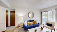 Located at 4142 SW Sixth Ave in Topeka, Kansas, this one-bedroom, one-bathroom residence offers a thoughtfully arranged single-floor layout. The living room serves as the heart of the home, featuring plush carpeting, a textured ceiling, and a large sliding glass door with vertical blinds that fills the space with natural light and provides access to the outdoors. A tiled entryway transitions seamlessly into the carpeted living area, lending a practical and welcoming flow throughout.

The galley-style kitchen is equipped with warm honey-toned wood cabinetry, light countertops, and hardwood-style flooring. It includes a full suite of appliances — a refrigerator, stovetop range, and dishwasher — along with ample cabinet storage and a double-basin sink, making efficient use of the available space.

The primary bedroom is generously sized, featuring soft carpeting, a ceiling fan with light fixture, and its own sliding glass door offering additional natural light and outdoor views. A dedicated closet and room for a full dresser add to its practicality.

The bathroom includes a wood-toned vanity with a single sink, a wide mirror, tile flooring, and a shower-tub combination. A connecting hallway ties all rooms together, completing this efficiently designed and comfortable residence.