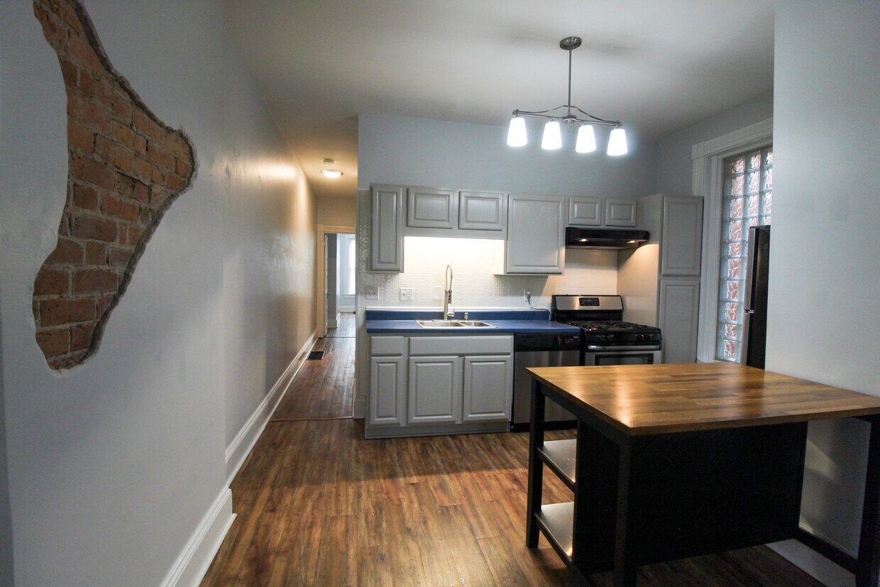 Kitchen with hallway to bathroom/bedroom - 421 Hopkins St