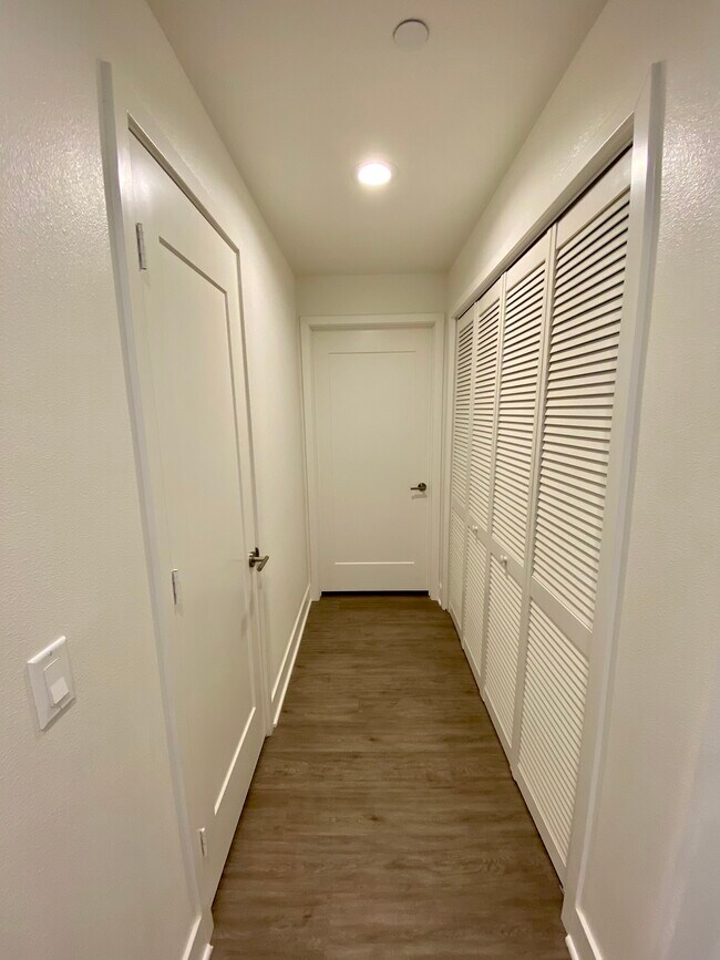 Corridor to Storage, Laundry Nook, and Powder Room. - 56 E Duarte Rd