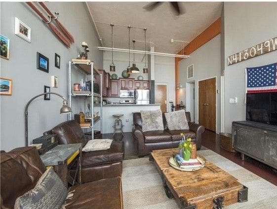 Living room pictured standing by windows - 1133 9th W St
