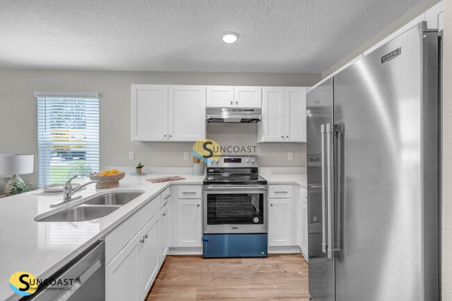 Foto del edificio - 6451 Breezy Oaks Wy