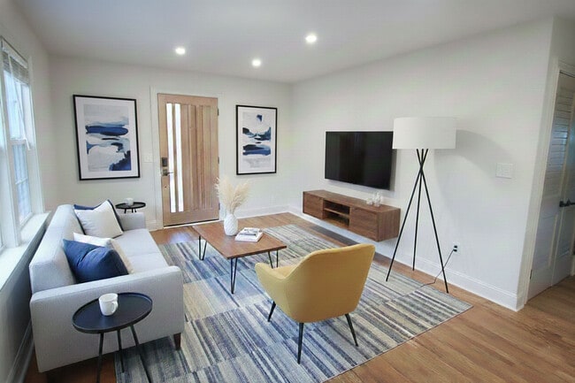 Virtual staging of living room - 2406 Boswell Rd