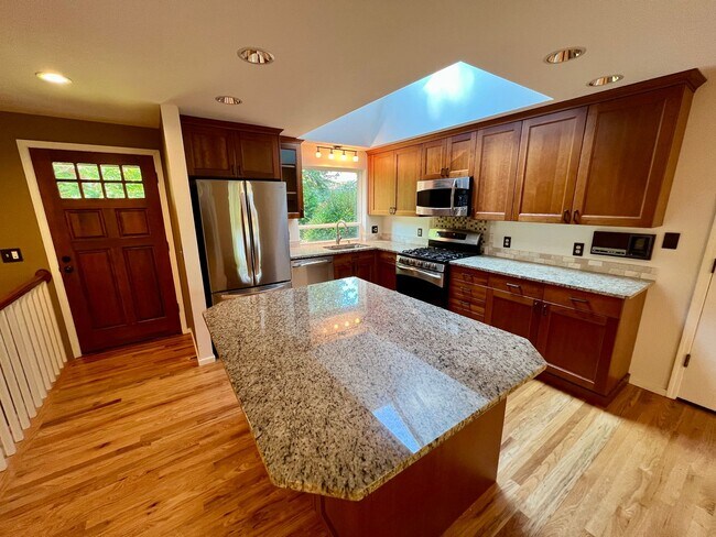 Building Photo - Spacious and Serene: Stunning 4-Bedroom Re...