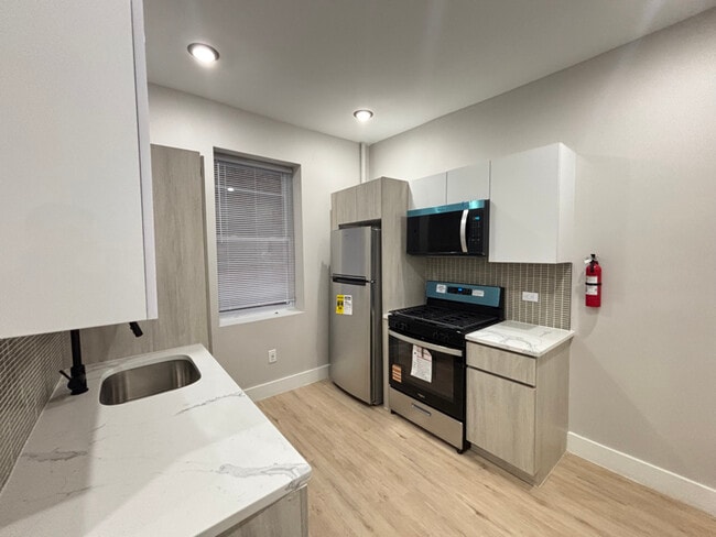 Photo - 5008 Palisade Ave Apartment