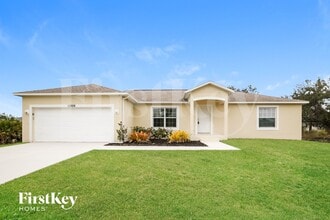 Building Photo - 11986 Booth Ave