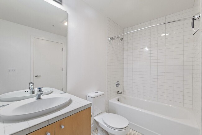 Building Photo - The Civic Condominiums - 8th floor west facing studio w/parking/ most utilities/concierge/views (...