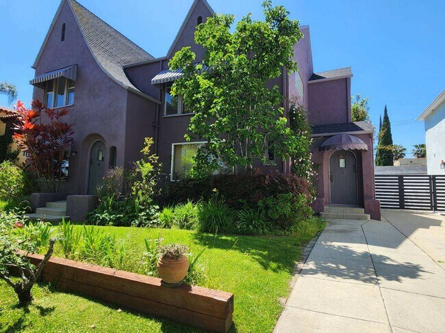 Front entrance for upper unit on right under awning. - 1251 S Sycamore Ave