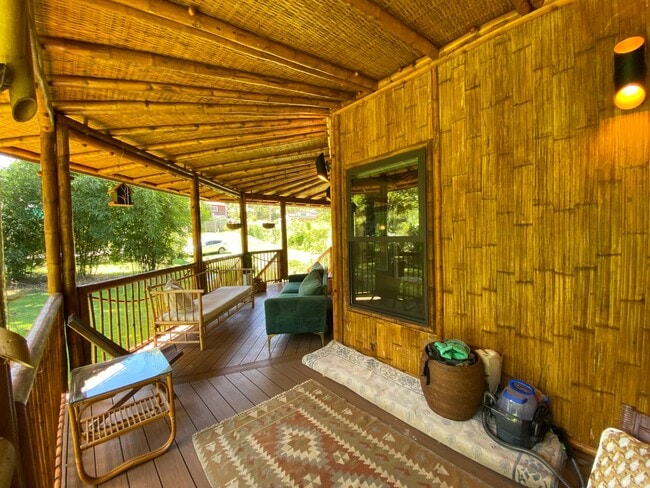 Building Photo - For Rent: Custom Bamboo Home with Lush Garden Setting