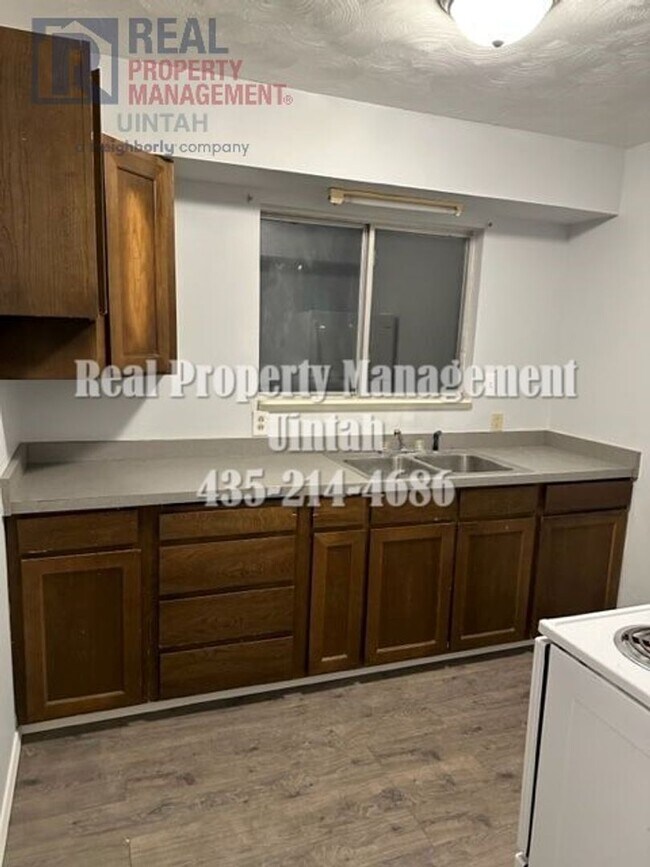 Foto del edificio - Cute 1-to-2-bedroom apartment.  MOVE IN SP...