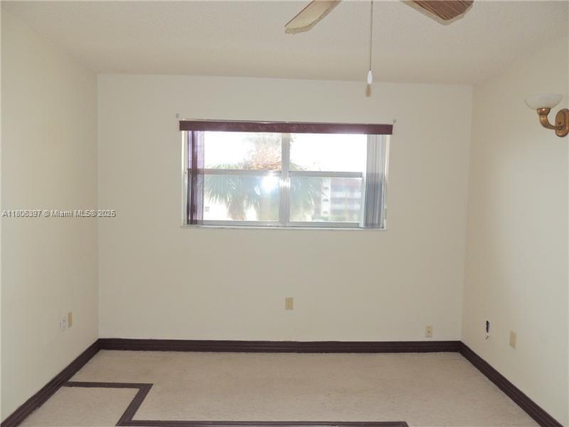 Building Photo - 8595 Sunrise Lakes Blvd