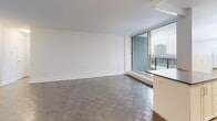This 660 square foot apartment in Mississauga offers a thoughtful layout maximizing space and functionality. The single-floor design encompasses a generous 140 square foot bedroom, a well-appointed bathroom, and an open-concept kitchen and living area. The kitchen boasts modern appliances, including a stainless steel dishwasher, and stylish light-colored cabinetry complemented by subway tile backsplash. Large windows throughout provide abundant natural light, enhancing the sense of spaciousness. The living area features durable parquet flooring, creating a warm aesthetic. A standout feature is the balcony, accessible via sliding glass doors, offering panoramic city views. The bathroom is finished with crisp white tiles and includes a combination bathtub and shower. Built-in closets in the bedroom provide ample storage. The apartment's neutral color palette and clean lines create a contemporary feel, making it an ideal canvas for personal style. Located at 3480 Havenwood Dr in Mississauga, this apartment combines urban convenience with comfortable living.