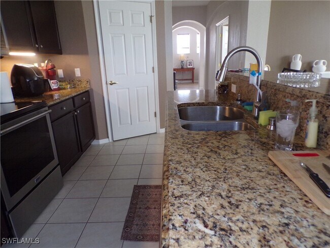Building Photo - 14782 Calusa Palms Dr