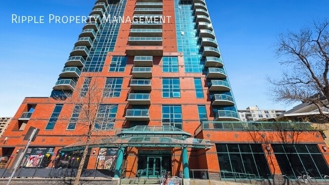 Building Photo - SOPHISTICATED 1-BED + DEN CONDO AT EMERALD STONE | MASSIVE PRIVATE PATIO & AC