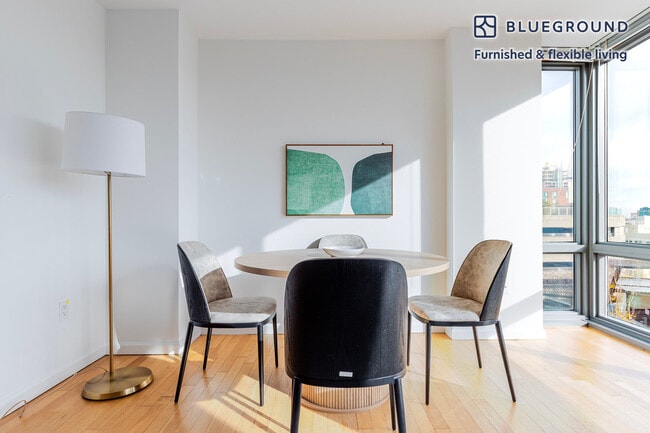 Building Photo - 4-75-75 48th Ave