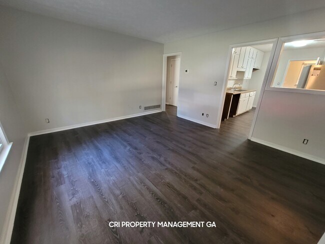 Foto del edificio - 5566 Rock Garden Ct NW