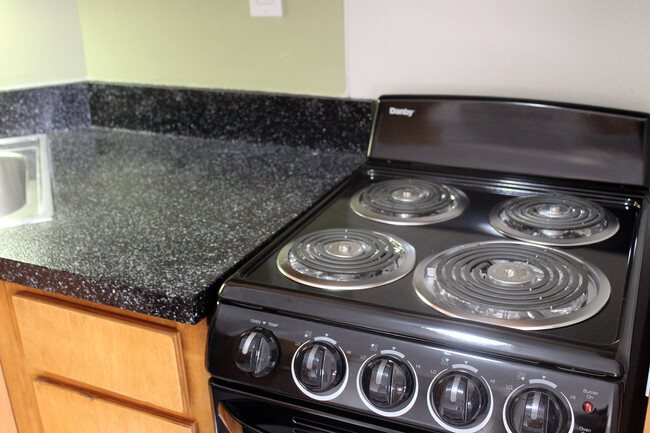 Remodeled - Black Appliances and Counter - Westmoor Apartments