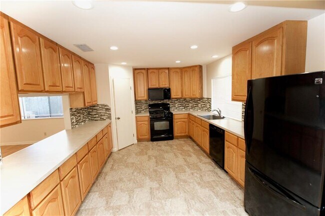 Building Photo - 4700 Running Deer Dr