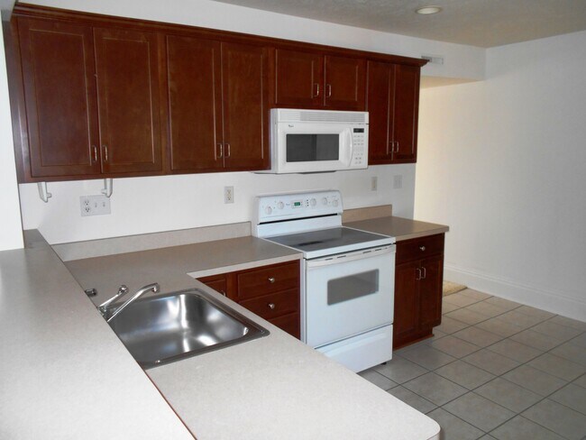 eat in kitchen with electric stove, microwave - 2502 Powell Ave