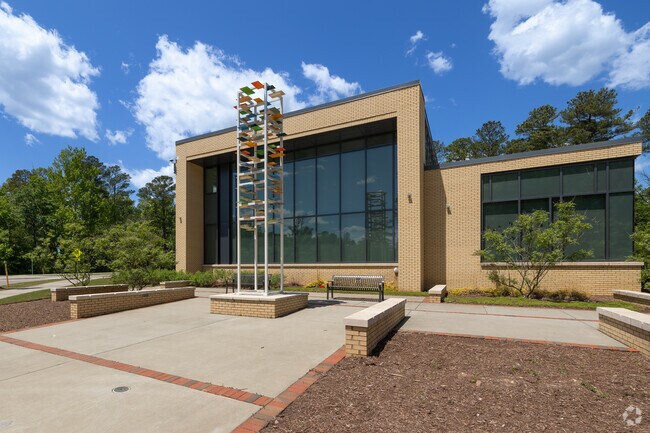 The Morrisville Community Library features an artistic monolith out front.