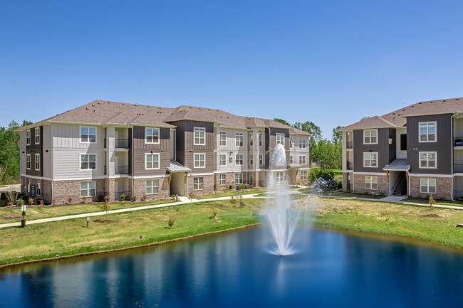 Building Photo - The Palms at Sunset Lakes Apartment Homes