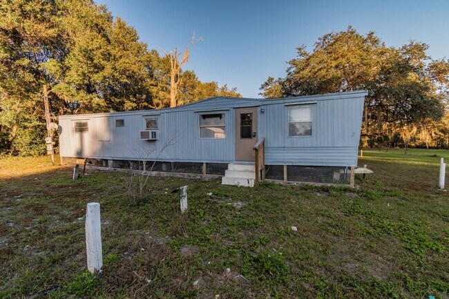 Foto del edificio - 2BR, 1BA Mobile Home with screened patio