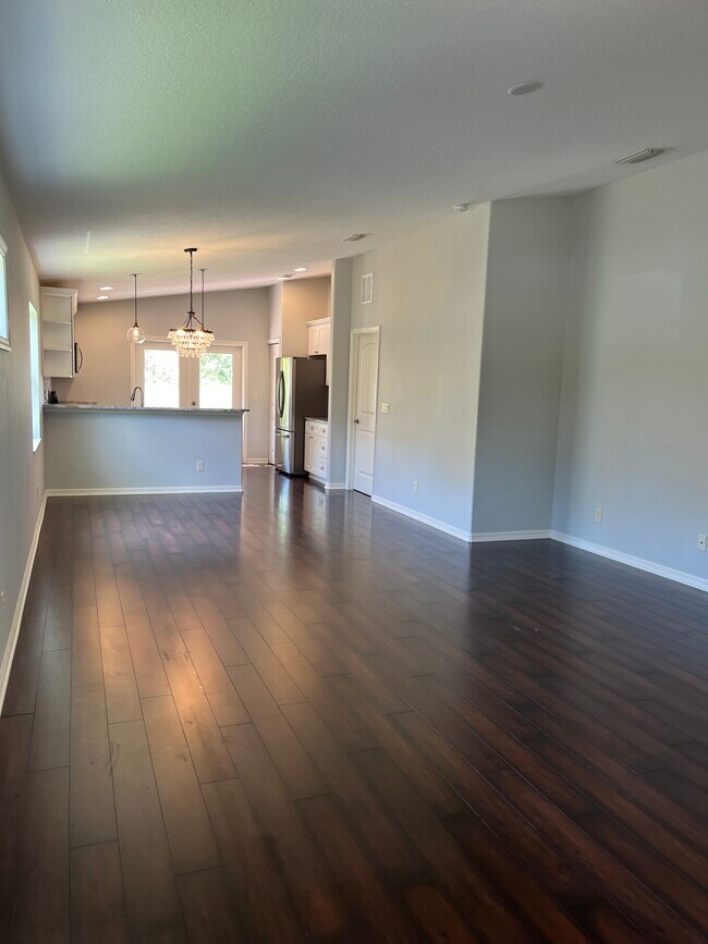 Open concept family room, dining and kitchen - 110 San Lorenzo Ct